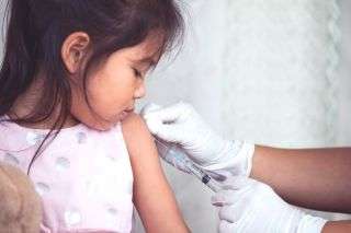 A child getting a flu shot.