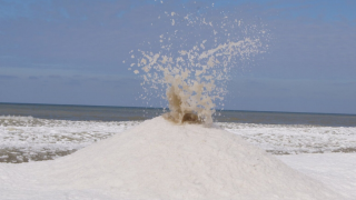 Bizarre ‘ice volcanoes’ erupt on Lake Michigan beach