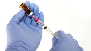 dexamethasone being drawn into a syringe