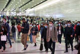 People wearing masks in a metro station in Hong Kong on March 3.