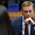 Putin critic Alexei Navalny taken to Berlin still in coma after being ‘poisoned’ by tea