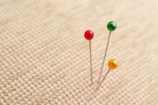 Sewing pins in fabric