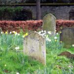 Man finds hidden tombstone in garden with eerie detail