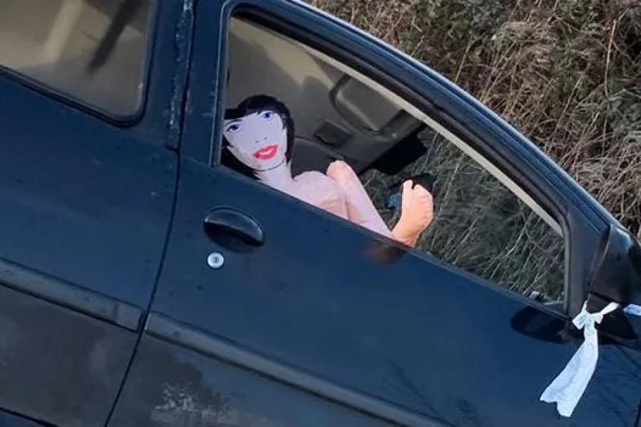 An inflatable doll was placed inside an abandoned car that crashed at a junction on Mill Land in Swindon, Wilts, as a prank which locals found hilarious. Release date 31 January 2025 Locals were left baffled when an inflatable doll was spotted inside an abandoned car that had crashed into a ditch. Following the crash on Mill Lane in Swindon, Wilts, the car was seen after the driver allegedly fled and an inflatable doll was placed in the empty seat. Pictures from the scene were shared online. Casey Warren-Keele was one of those who spotted the doll and found it hilarious, sharing the image on a Swindon community noticeboard.