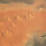 Earth from Space: Giant Pyramid-Shaped 'Star Dunes' Slowly Move Across Moroccan Desert