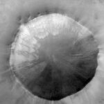 NASA's Mars satellite has discovered marks on the surface of Mars that look like blobs of paint running down a wall.