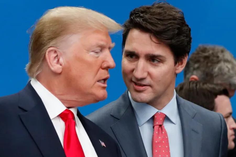 ARCHIVE - U.S. President Donald Trump, left, and Canadian Prime Minister Justin Trudeau talk before a NATO roundtable meeting at The Grove hotel and resort in Watford, Hertfordshire, England, Dec. 4, 2019. (AP Photo/Frank Augstein, file)