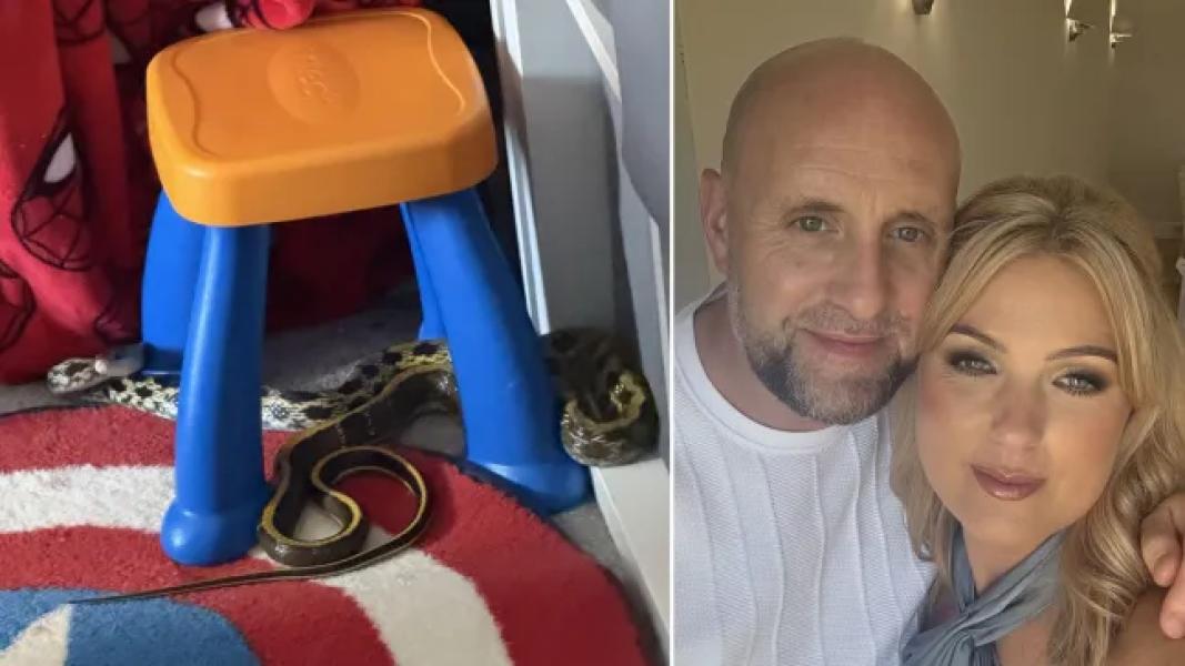 Natasha and Gary and the snake they found in their child's bedroom