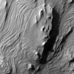 The Solar System's Longest Canyon Reveals New Secrets — Space Photo of…