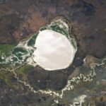 African Lake-Filled Crater Turned Into Giant Silver 'Mirror' Thanks to Rare Phenomenon – Earth from Space