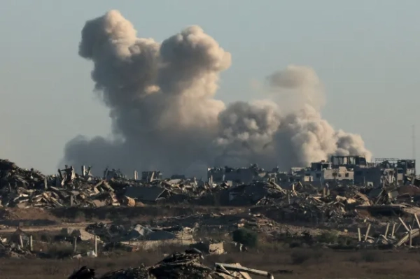 This photo taken from a position near Israel's border with the Gaza Strip shows plumes of smoke rising from an Israeli strike on the besieged Palestinian territory on August 29, 2025, amid the ongoing war between Israel and the Palestinian group Hamas. The Israeli military declared Gaza City a