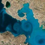 Rare Milky Plumes Create Stunning Swirls in World's Largest 'Soda Lake' –…