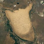 Giant sand 'slug' crawls across floodplains in Kazakhstan, but could soon freeze…