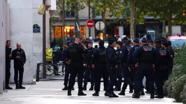 French police officers gather to secure a street in the 7th arrondissement of Paris after a security incident, September 11, 2025. REUTERS/Abdul Saboor