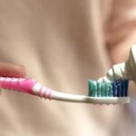 Why does my mouth sometimes smell even after brushing my teeth?