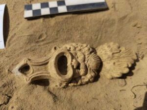 Roman lamp shaped like a theatrical mask found in the Netherlands