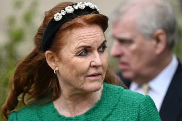 (FILES) Sarah Ferguson (L), followed by Britain's Prince Andrew, Duke of York, leaves St. George's Chapel, in Windsor Castle, after attending the Easter Mattins Service, on March 31, 2024. King Charles will strip his younger brother Andrew of his royal titles and long-term residence on the Windsor estate, the palace said on October 30, 2025, the latest fallout to hit the scandal-plagued royal over the Jeffrey Epstein affair. "Prince Andrew will now be known as Andrew Mountbatten Windsor," the palace said, adding that Charles had begun the formal process to strip the titles from his brother. (Photo by JUSTIN TALLIS / AFP) (Photo by JUSTIN TALLIS/AFP via Getty Images)