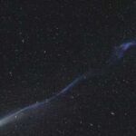 Blazing Comet Lemmon’s tail briefly shredded by solar tempest.