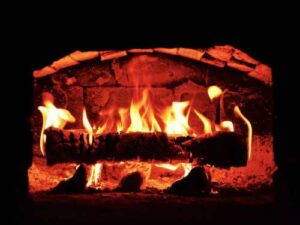 In the evening there was a knock on the window. “Never light…