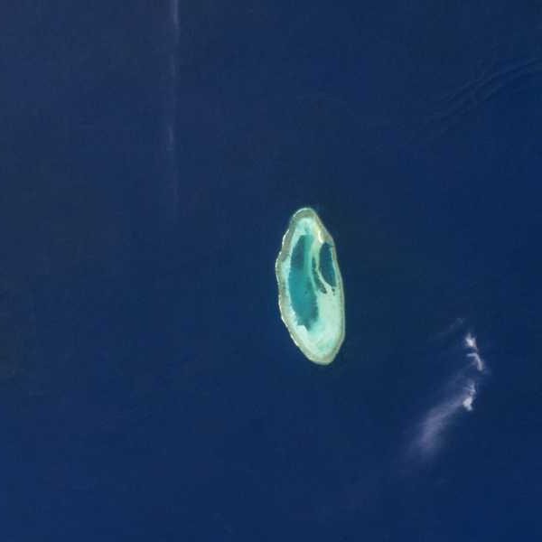 A Perfect Trio of Prehistoric Atolls Glow Like Tropical Jewels Off Australia’s&hellip;
