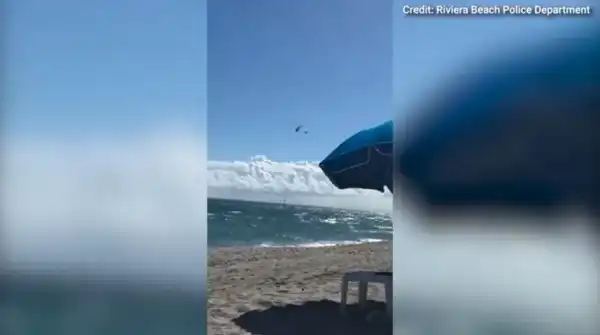 Florida paraglider plunges 500 feet into sea, lives.