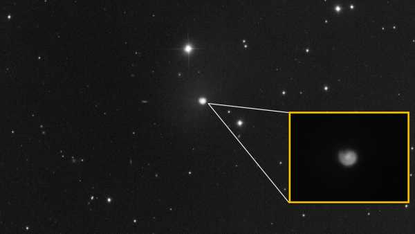 Cosmic Comet Becomes Luminous Snail Shape Following Huge Eruption