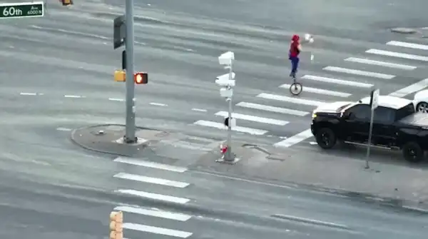 Daredevil Cyclist’s Fiery Stunt Halts Denver Commute