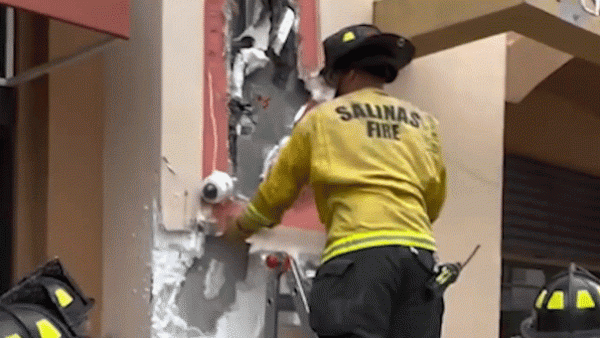 Californian police officers save a suspected burglar stuck in a wall for…